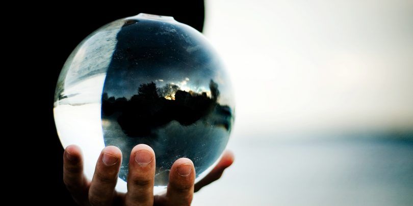 Hand Holding Crystal Ball